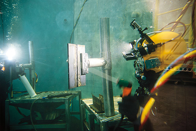 UBC Diver working with steel under water